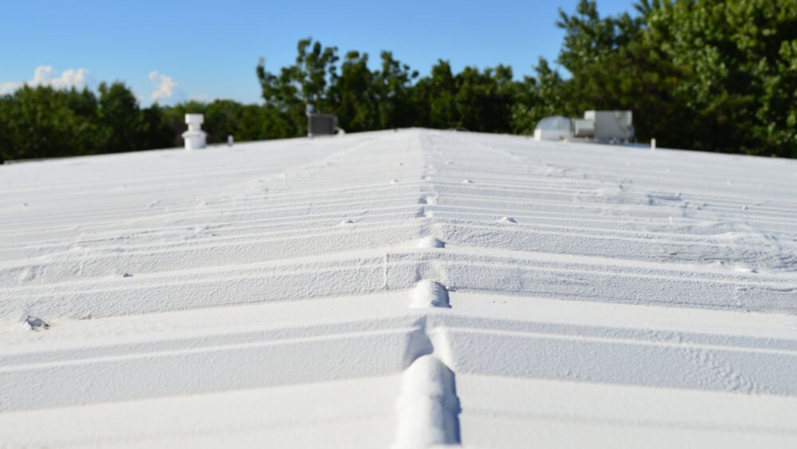 A bright white roof made of metal