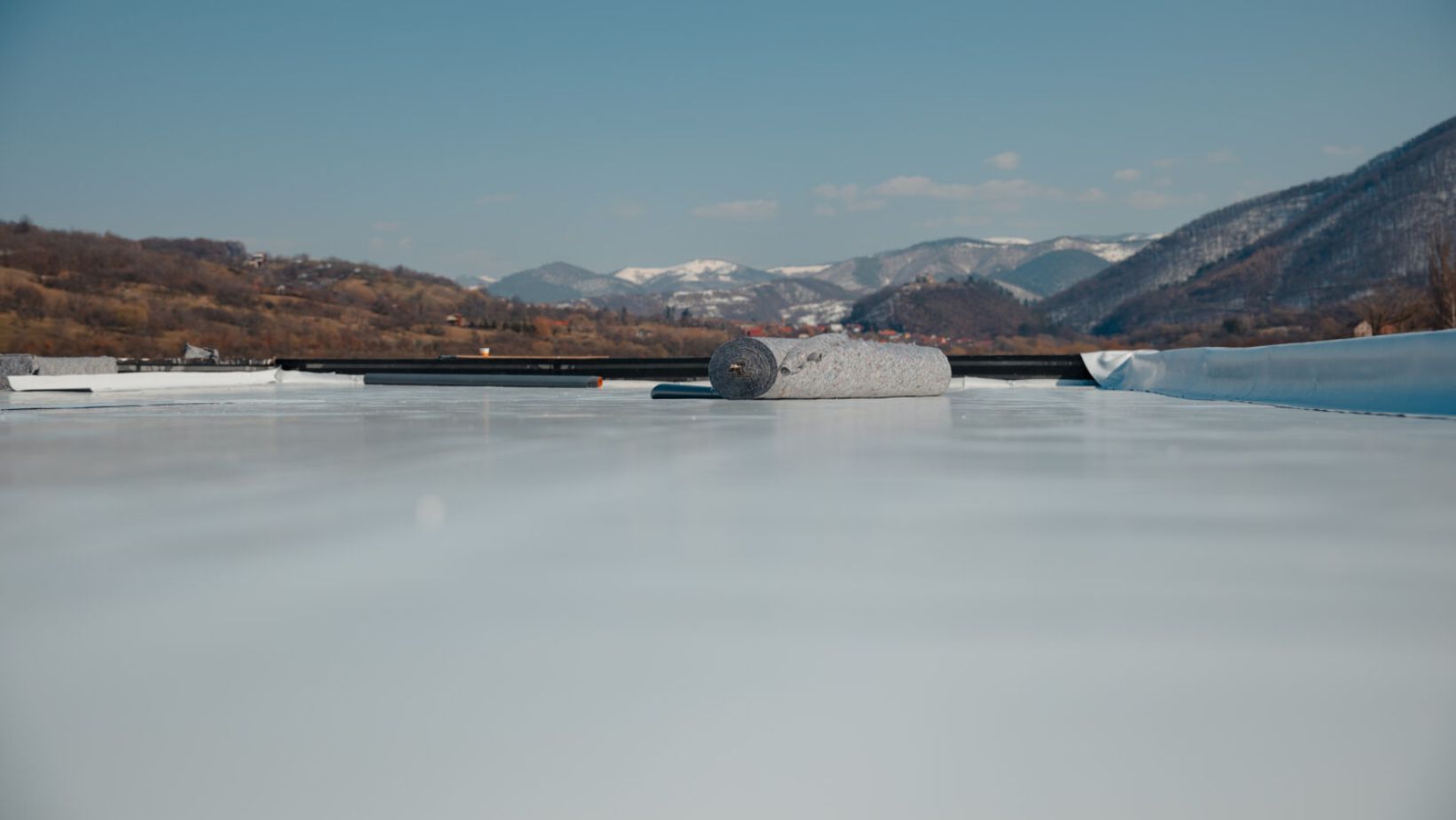 A white roof covered with a white coating
