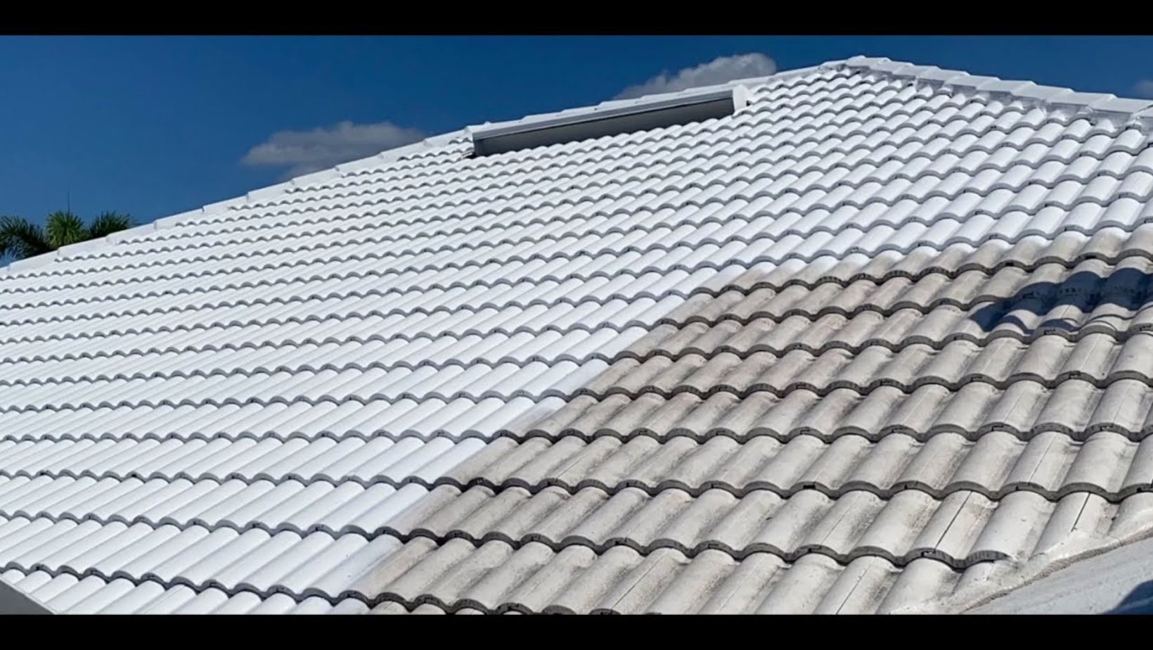 A roof featuring white tiles and a white coating