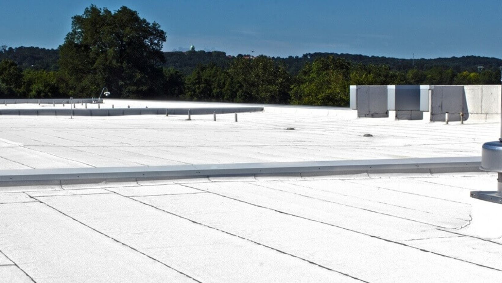 A white roof featuring a durable metal roofing system