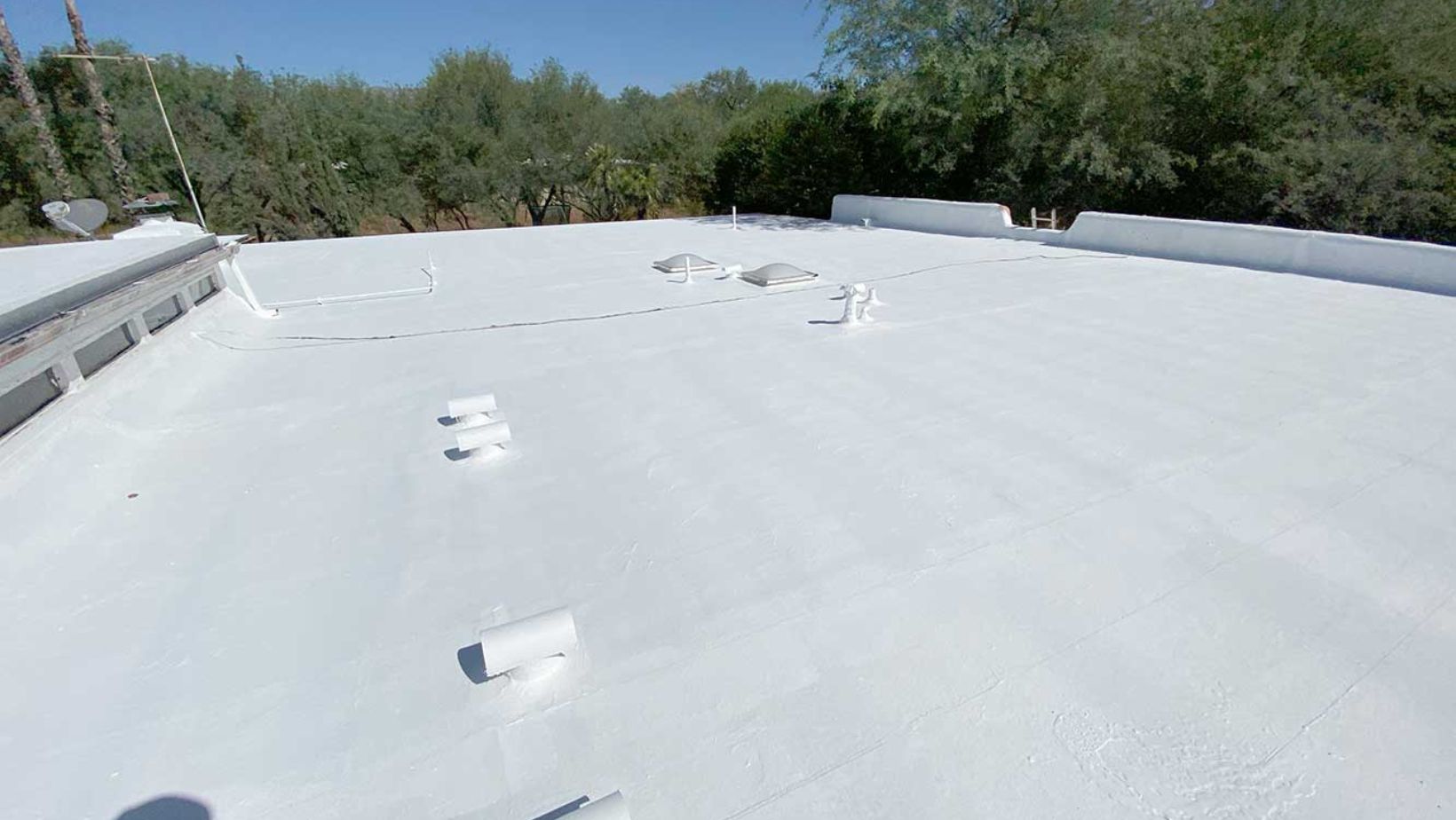A roof covered in white paint