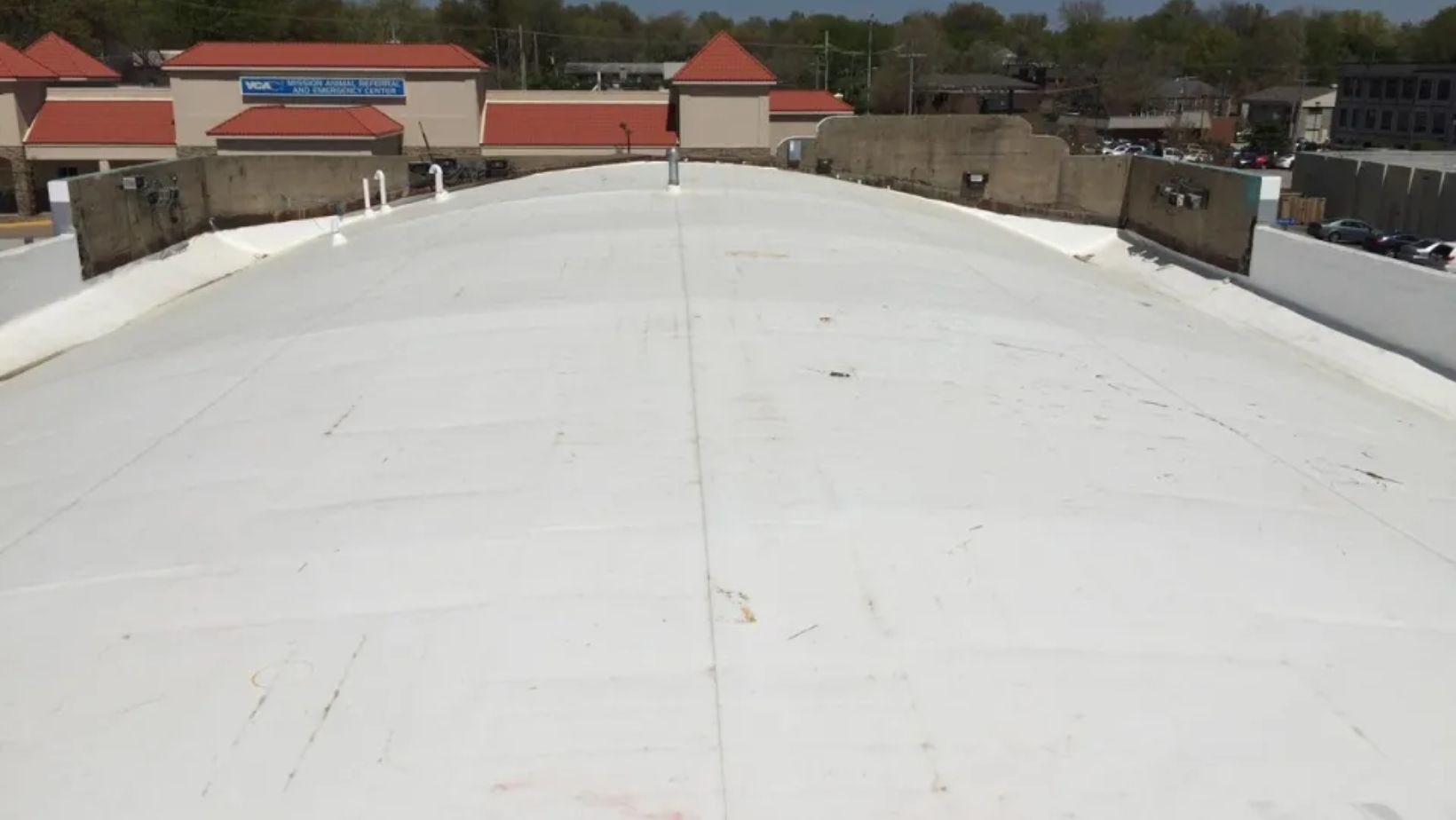 A building featuring a white roof
